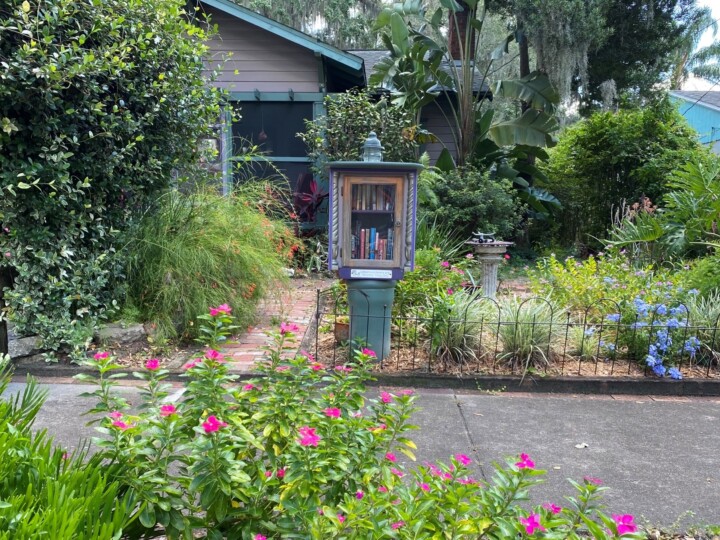 scenic picture of cottage style home and garden