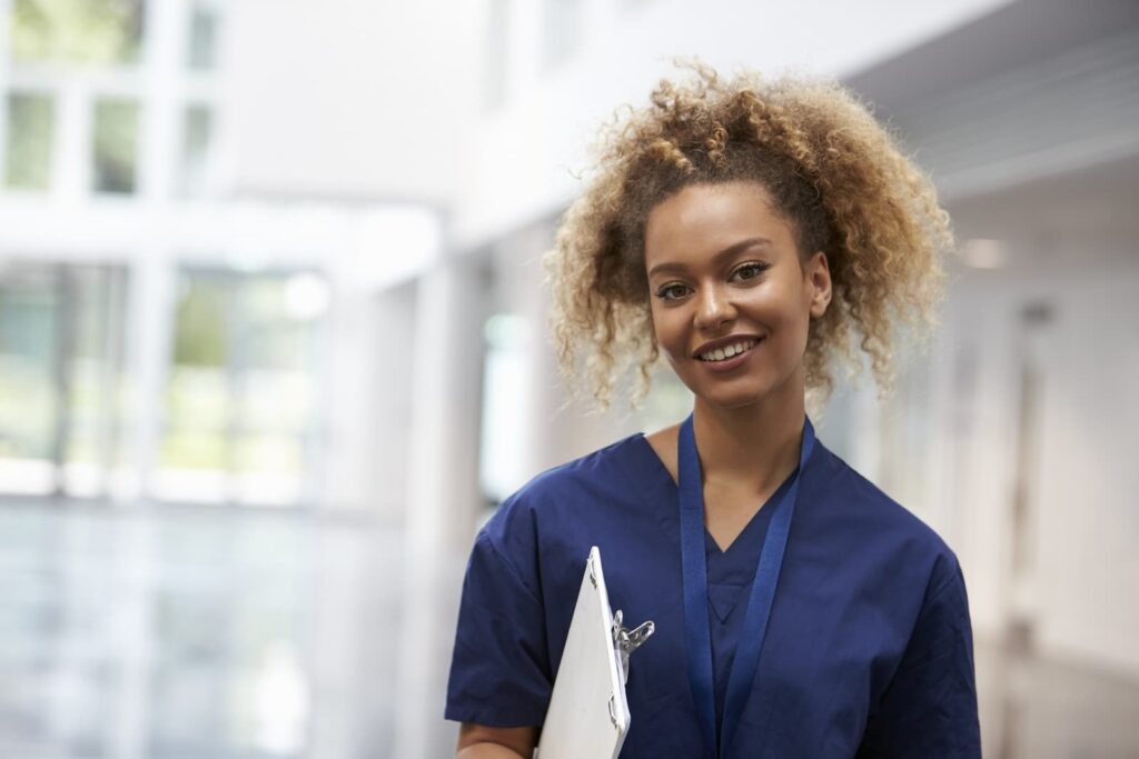 nurse holding a clipboard