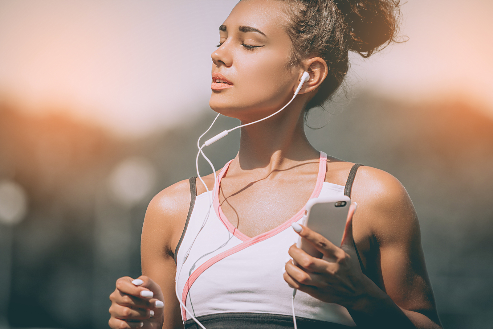 woman jogging listening to podcast