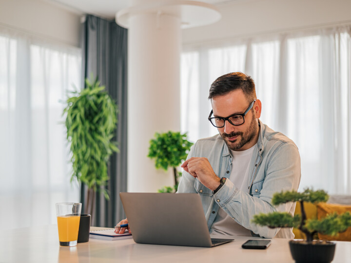 man looking at laptop