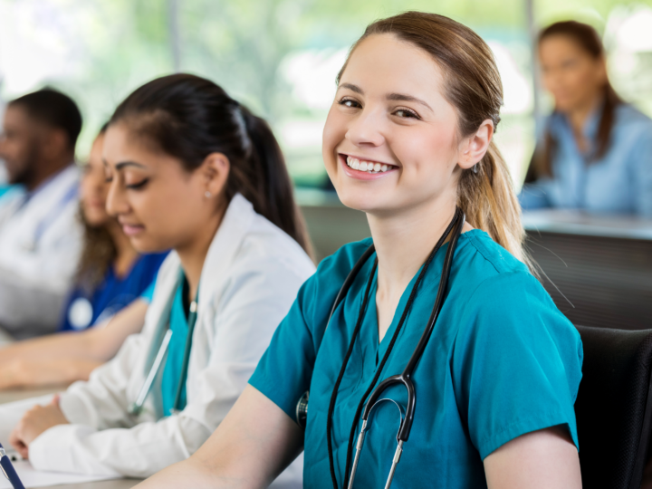 young smiling nursing student in classroom