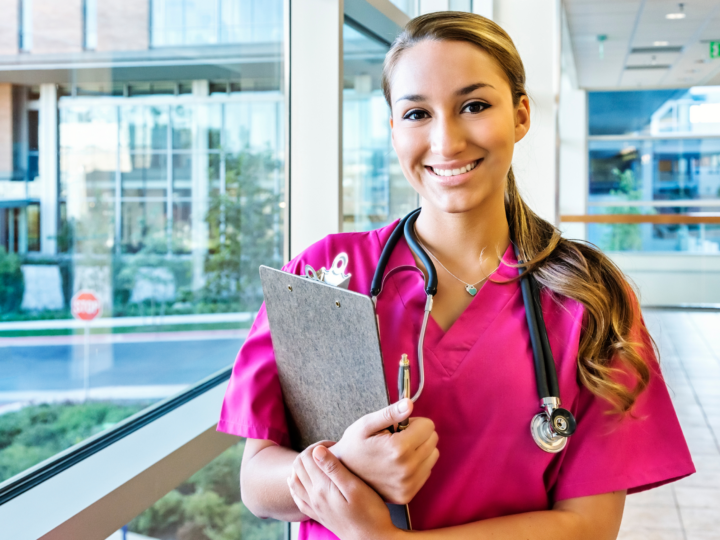smiling nurse holding clipboard