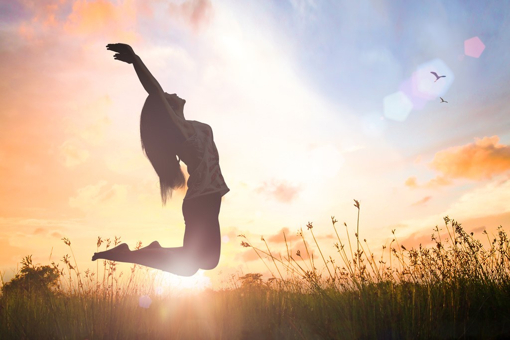 woman jumping in the air