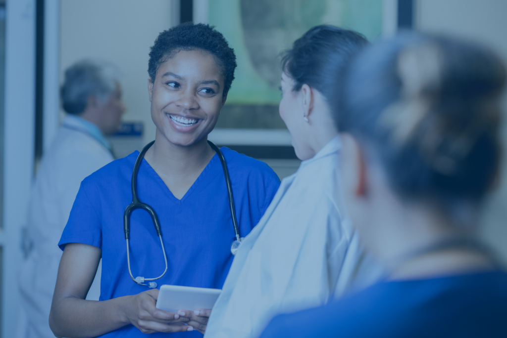 smiling nurse wearing stethoscope