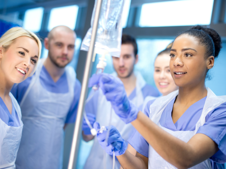 nurse holding an IV bag