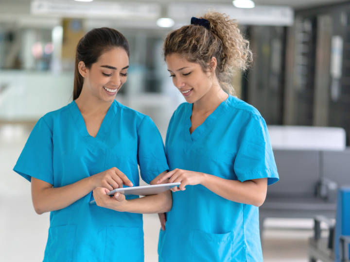 two nurses looking at tablet social media dos and don'ts