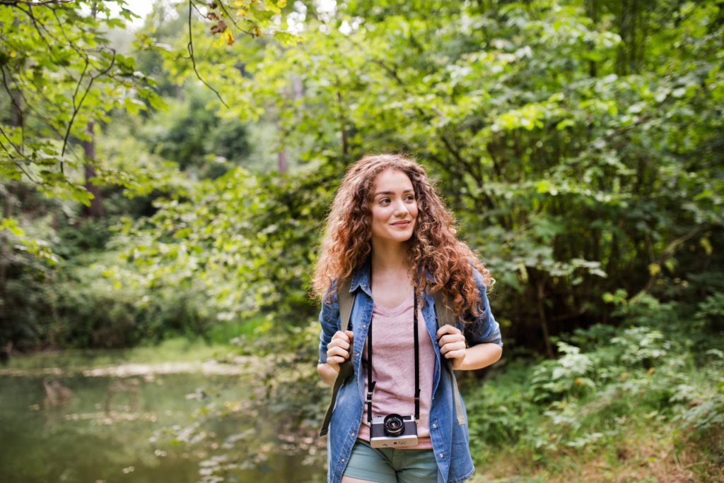woman hiking near water