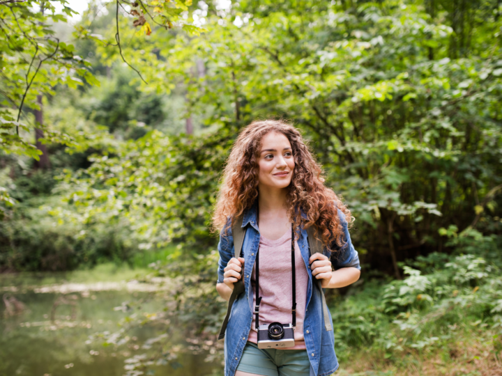 woman hiking near water