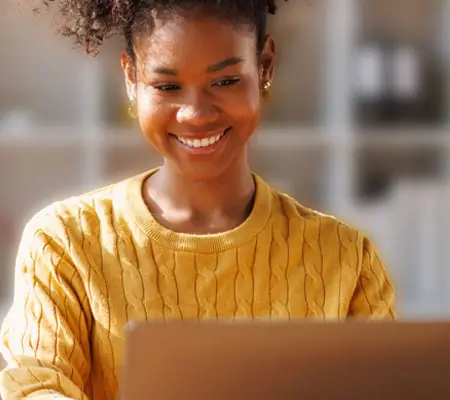 young African American woman on a laptop